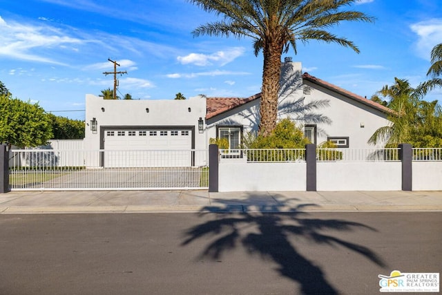 view of front of home with a garage