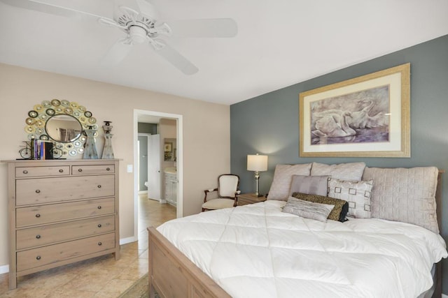 bedroom featuring connected bathroom and ceiling fan