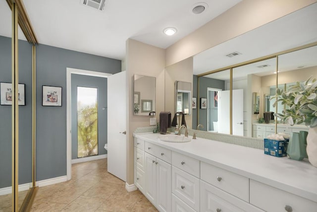 bathroom featuring vanity