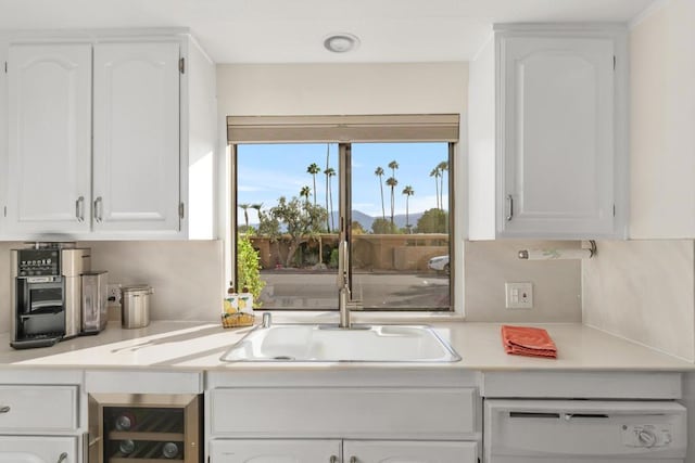 kitchen with white cabinets and dishwasher