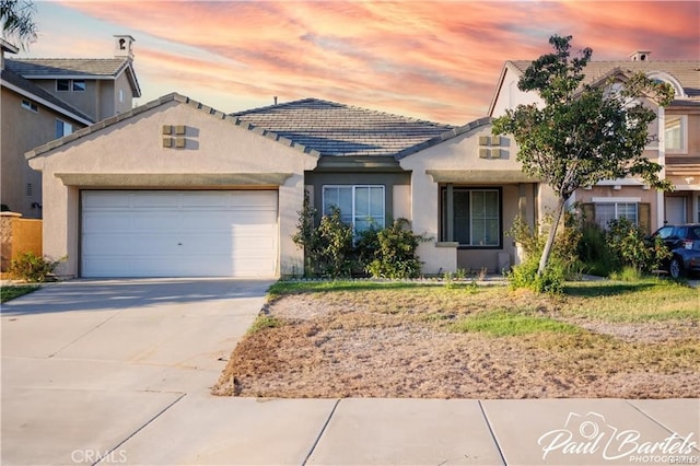 view of front of home featuring a garage