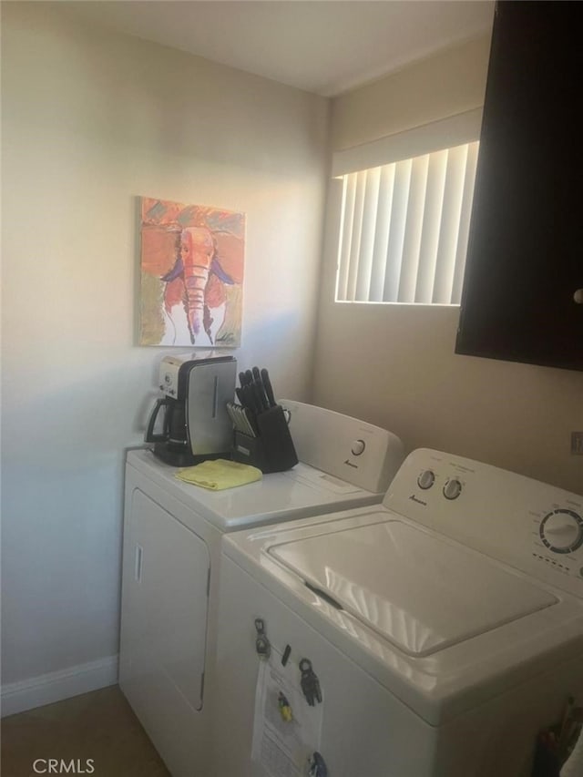 laundry room featuring independent washer and dryer