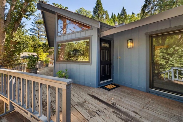 entrance to property featuring a deck