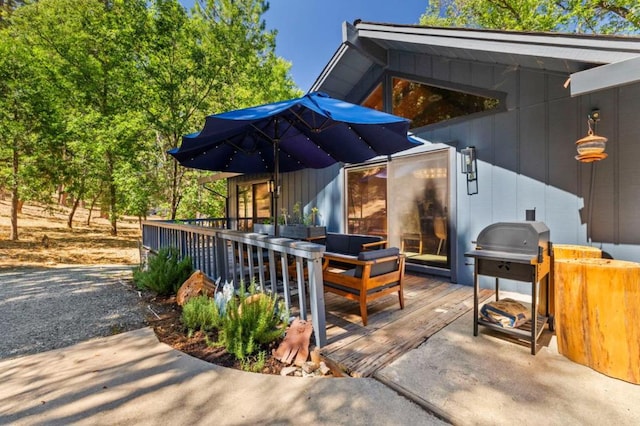 view of patio / terrace featuring a deck and area for grilling