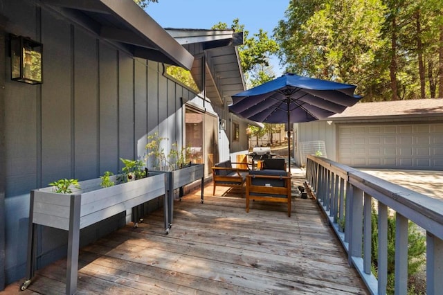 wooden terrace featuring area for grilling