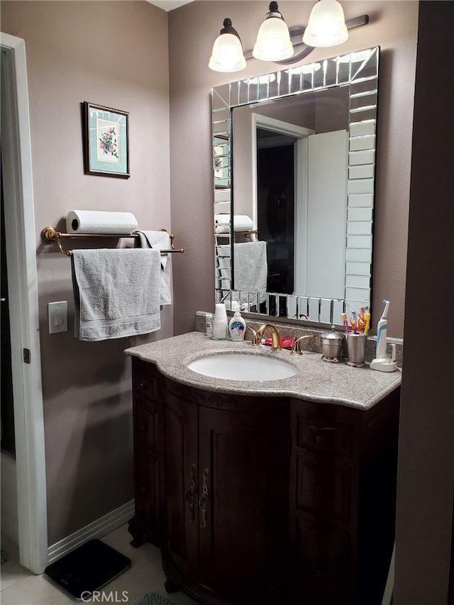 bathroom with vanity and tile patterned flooring