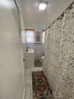 bathroom featuring tile patterned floors