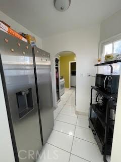 kitchen featuring light tile patterned flooring