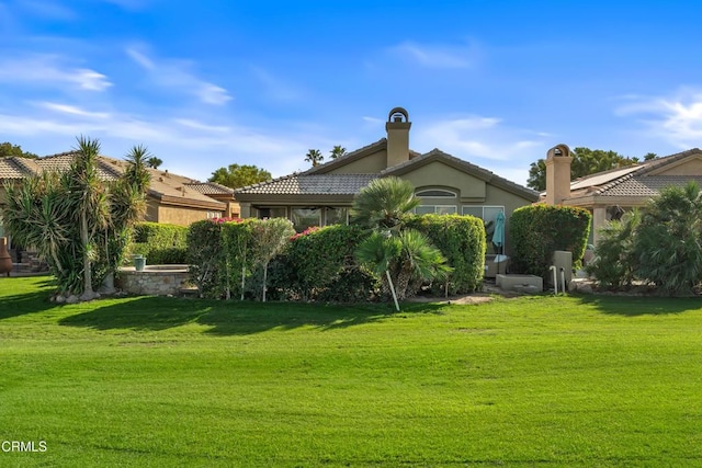 exterior space with a lawn