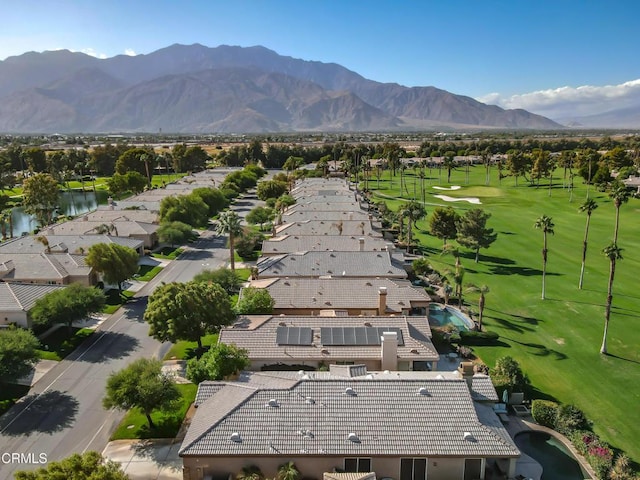 bird's eye view with a water and mountain view