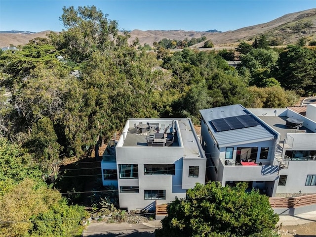 drone / aerial view featuring a mountain view