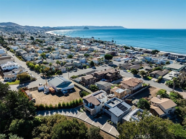 bird's eye view featuring a water and mountain view