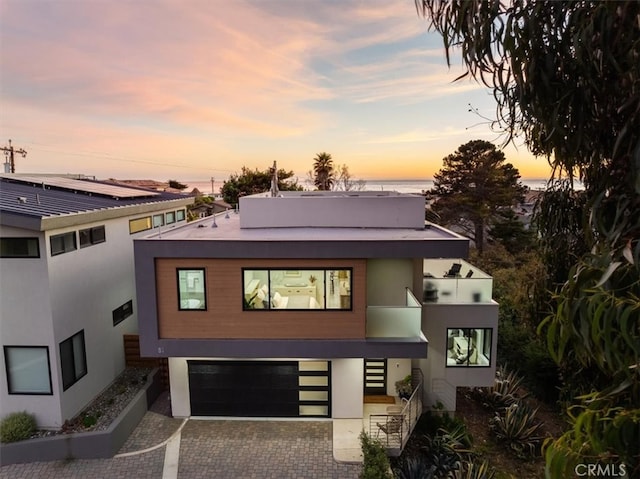 modern home featuring a garage