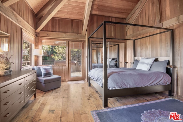 bedroom featuring wood walls, light hardwood / wood-style flooring, high vaulted ceiling, and wooden ceiling