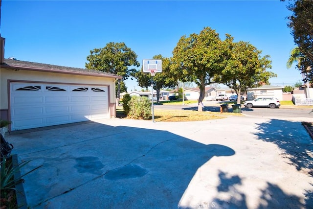 view of yard with a garage