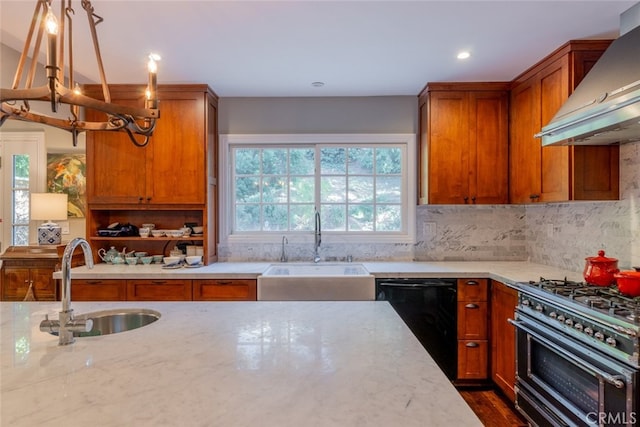 kitchen with dishwasher, gas stove, wall chimney exhaust hood, and sink