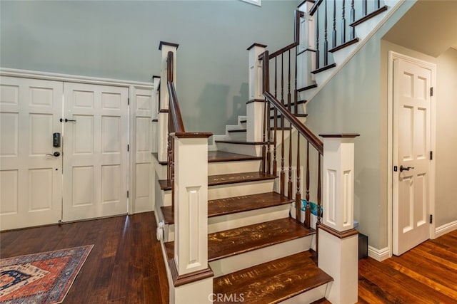 entrance foyer featuring dark wood-type flooring