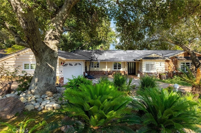 ranch-style home with a garage