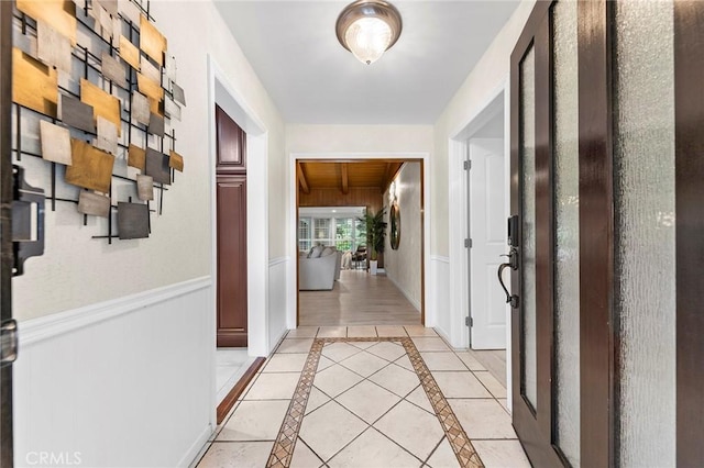 hallway with light tile patterned flooring