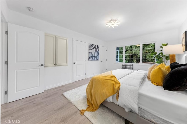 bedroom featuring light hardwood / wood-style floors