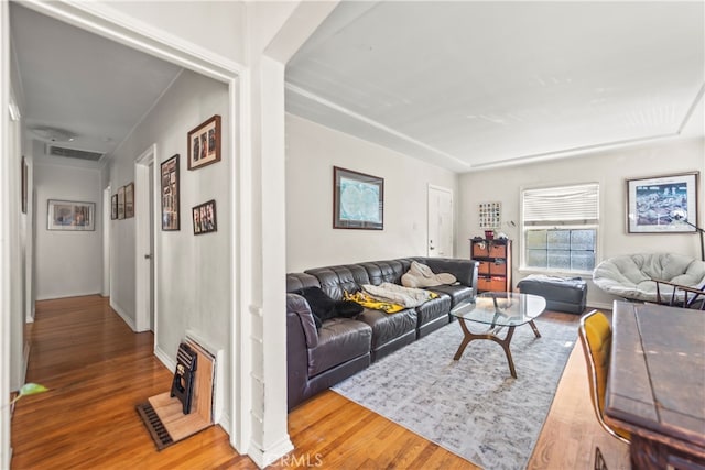 living room with hardwood / wood-style flooring