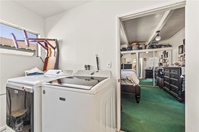 washroom featuring carpet floors, laundry area, and washing machine and dryer