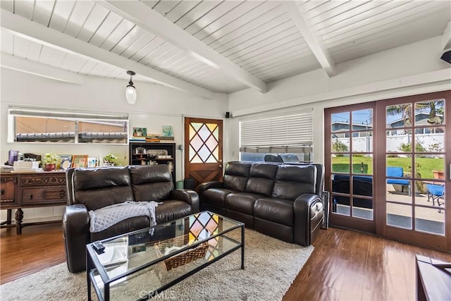 living room with dark wood-style floors, french doors, wooden ceiling, and beam ceiling