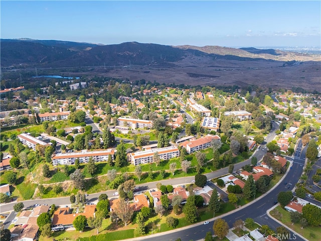 bird's eye view with a mountain view