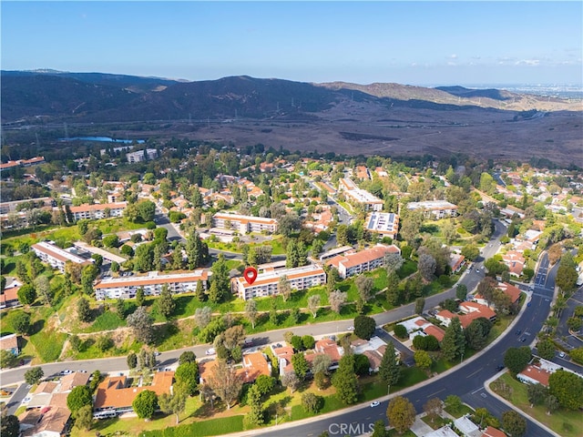 bird's eye view with a mountain view