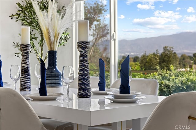 dining area featuring a mountain view