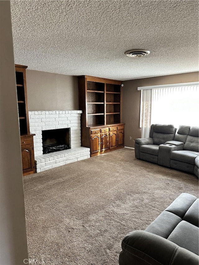 living room with a textured ceiling, light colored carpet, and a fireplace