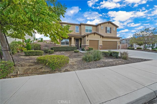 craftsman-style home with a garage