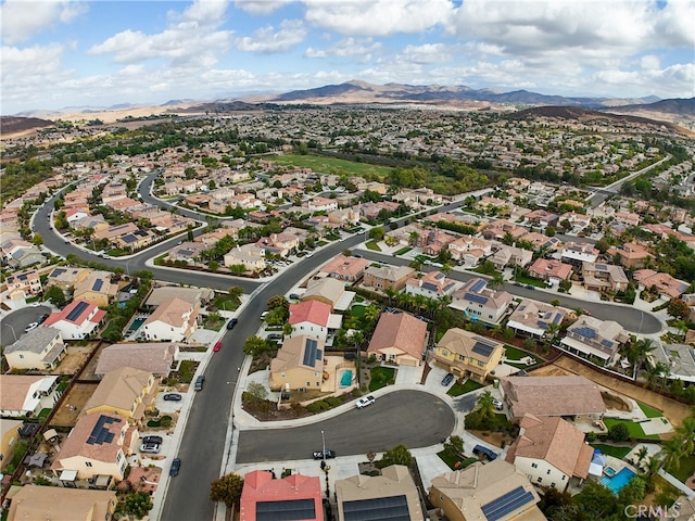 birds eye view of property featuring a mountain view