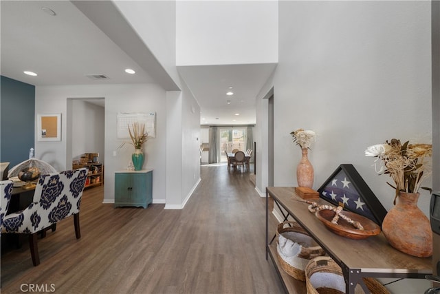 hallway with dark wood-type flooring