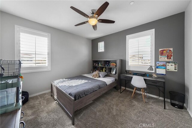 bedroom with ceiling fan and carpet flooring