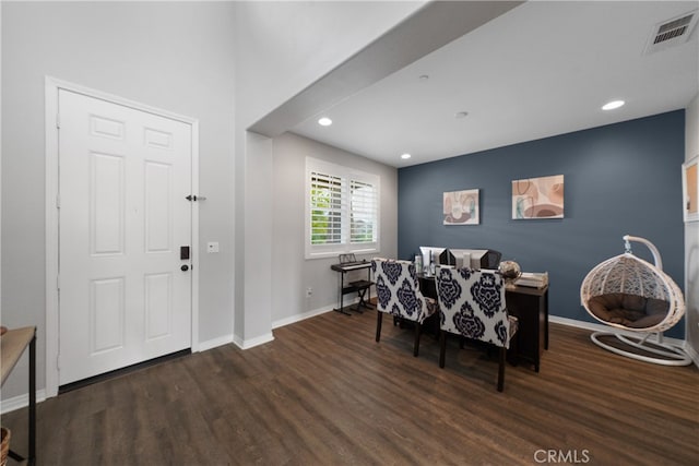 dining space with dark wood-type flooring