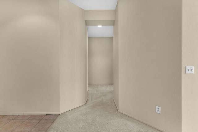 corridor with light carpet