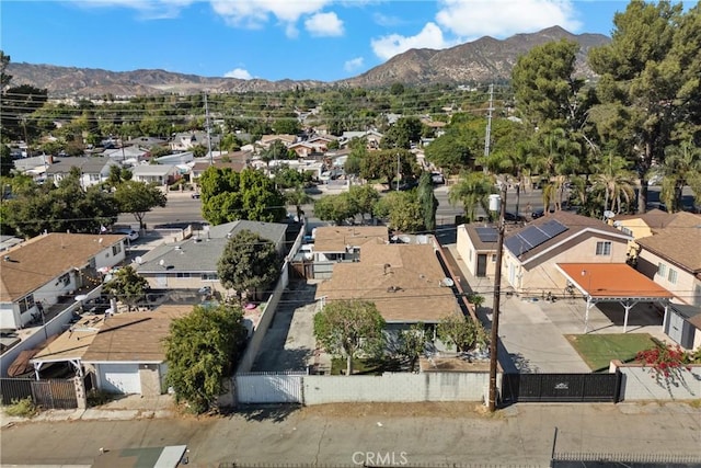 drone / aerial view featuring a mountain view