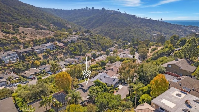 birds eye view of property with a mountain view