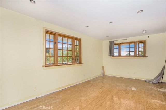 unfurnished room featuring wood-type flooring