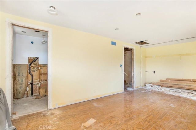 empty room with wood-type flooring