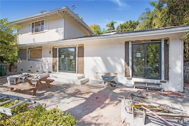 rear view of property with a patio area