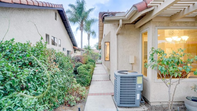 view of side of property featuring cooling unit