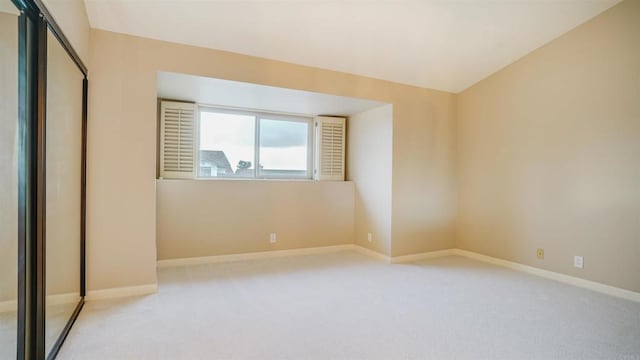 unfurnished bedroom with carpet flooring