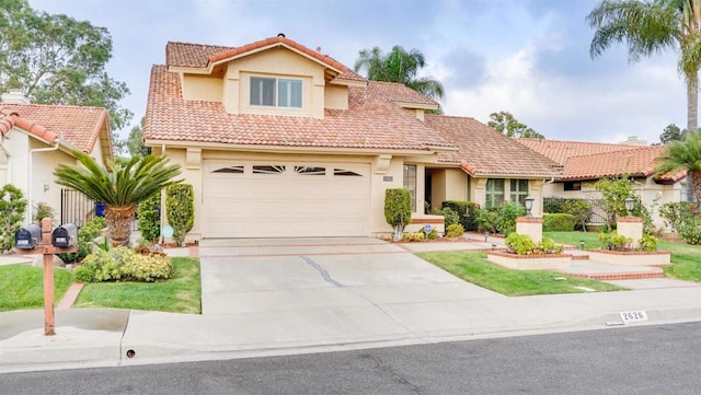 mediterranean / spanish home featuring a garage