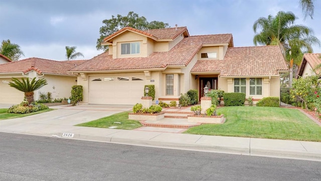 mediterranean / spanish-style house featuring a front yard