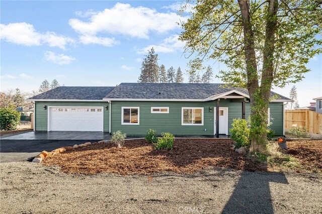 ranch-style home with a garage