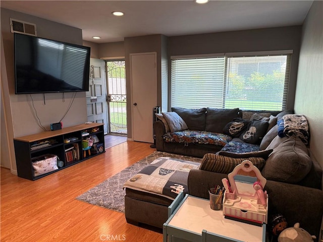 living room with hardwood / wood-style flooring