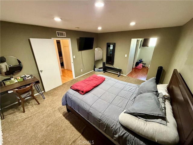 bedroom with light wood-type flooring