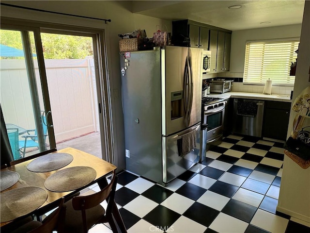 kitchen featuring backsplash and stainless steel appliances